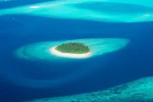 View from the plane on the island located in the Maldives
