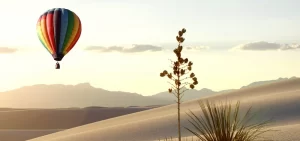 Hot Air Balloon over White Sands at Sunrise