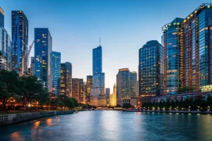 Beautiful illuminated Chicago Cityscape from Chicago River Waterfront at Dusk. Long time exposure. Chicago, Illinois, USA.
