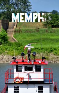 Pilot house on a cruise boat, docked in Memphis, Tennessee, faces the big sign that says Memphis.