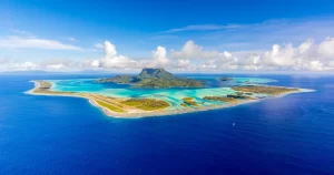 Aerial panoramic view of Bora Bora, French Polynesia and its famous lagoon located in the South Pacific Ocean
