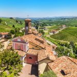 Town Of Barolo Among Rolling Hills With Vineyards