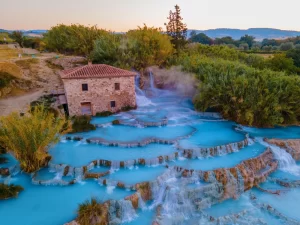 View of natural spa with waterfalls and hot springs at Saturnia thermal baths
