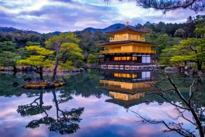 Twilight scenic view at Kinkaku-ji, the Golden Pavilion, a Zen Buddhist temple in Kyoto, Japan