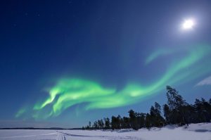 Aurora Borealis over Lake Inari in Lapland in Northern Finland.