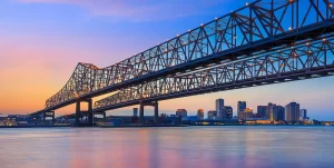 The crescent city connection bridge on the mississippi river and downtown new orleans louisiana