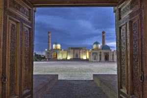 View over the Khast Imam Mosque through wooden doors, Tashkent, Uzbekistan.