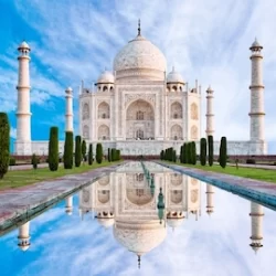 view on the Taj Mahal with reflection in water.