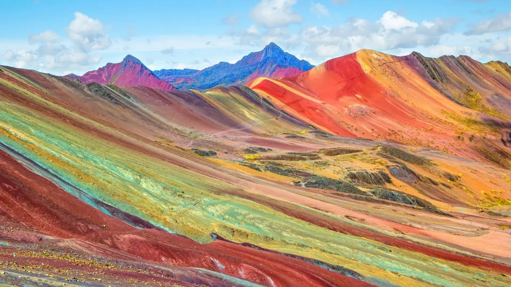 Vinicunca o Winikunka. Chiamata anche Montana de Siete Colores. Montagna delle Ande del Perù | Viaggio perù e Amazzonia 16 giorni | Alidays Travel Experience