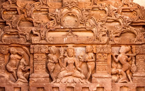 sculpture of God and Goddess at the Chand Baori stepwell in Abhaneri, Rajasthan, North India.
