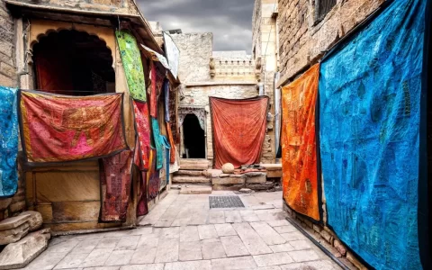City street market with shops of Jaisalmer fort in Rajasthan, India