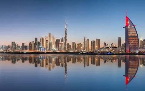 Dubai Skyline and Downtown with Reflection in Sunset colors