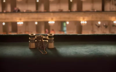 Opera concept. Opera glasses in concert hall