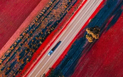 Aerial image of the road in Western Australian Golden outback.The soil is red as it is rich in iron ore.