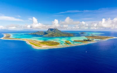 Aerial panoramic view of Bora Bora, French Polynesia and its famous lagoon located in the South Pacific Ocean