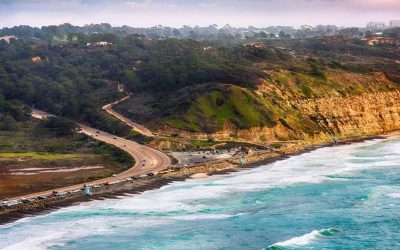 Highway 101 along the southern California coastline as it reaches the cliffs of the famous Torrey Pines reserve in the La Jolla area of the City of San Diego.  This image was shot at an altitude of approximately 1000 feet over the Pacific Ocean during a helicopter photo flight.