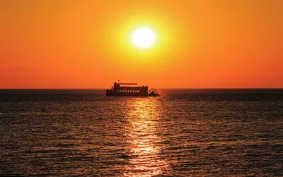 cruise boat on a lake Michigan at sunset